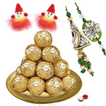 Daintily Arranged Ferrero Rocher Chocolates in a Golden Plated Thali with Family Set of Rakhi and Roli Tilak Chawal