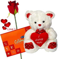 Cadburys Celebration Pack with a silk rose and  A 12 inch Cute Teddy Bear.