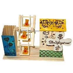 Extravagant Love Wooden Pen Stand with House and Wheel Swing