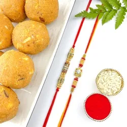 Traditional Rakhi Duo with Lovely Besan Ladoos