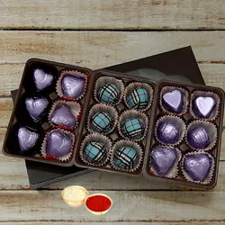 Mouthwatering Pack of 18pcs Assorted Homemade Chocolate. with free Roli Tilak and Chawal.