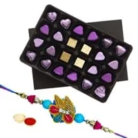 Sumptuous n Delightful pack of 24 pcs Assorted Home made Chocolates with Rakhi and Roli Tilak Chawal