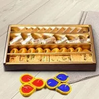 Assorted Sweets from Haldiram with wax Diya