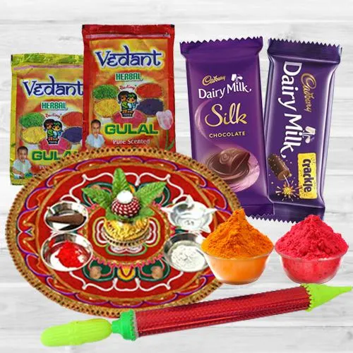 Colorful Holi Combo of Puja Thali with Herbal Gulal Pichkari N Dairy Milk Chocolate