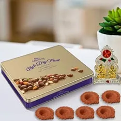 Diwali Gift of Cadbury Rich Dry Fruits Tin n Laxmi Ganesh Idol Free Diya