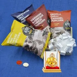 Classy Gift Hamper of Flavored Popcorn with Vighness Idol N Free Roli Tika