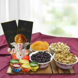 Ecstatic Cadbury Chocolates N Dry Fruits with Lord Idol N Diya