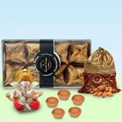 Tasty Pyramid Baklawa with Almond Potli Ganesha Idol n Diya