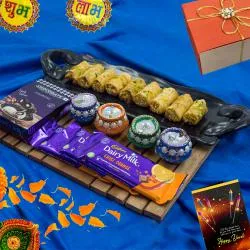 Finest Selection of Roll Baklava n Cadbury Chocolates with Wax Diya