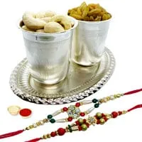 Special dry fruit hamper in Silver plated Glass and tray with 2 free Rakhi Roli tilak and Chawal