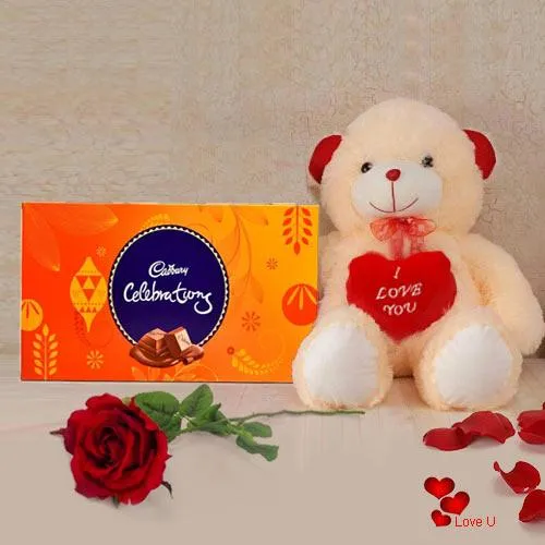 Cadburys Celebration Pack with a silk rose and  A 12 inch Cute Teddy Bear.