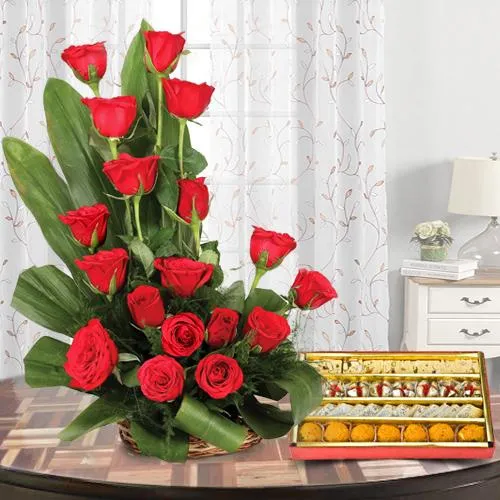 Haldirams Assorted Sweets with Red Roses Arrangement