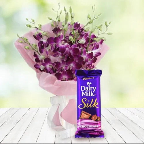 Combo of Cadbury Dairy Milk Silk and Orchids Bouquet