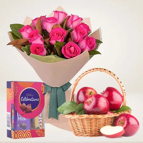 Tangy Bunch of Pink Roses with Dairy Milk Celebration and Apples Basket