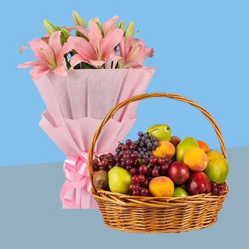 Attractive Lilies Bouquet with Basket of Fresh Fruits