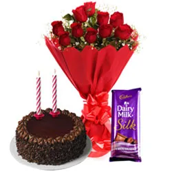 Charming Red Roses Bouquet with Dairy Milk Silk Chocolate Cake and Candles