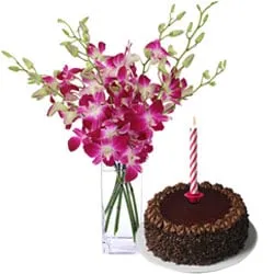 Delicious Chocolate Cake with Candles and Orchids