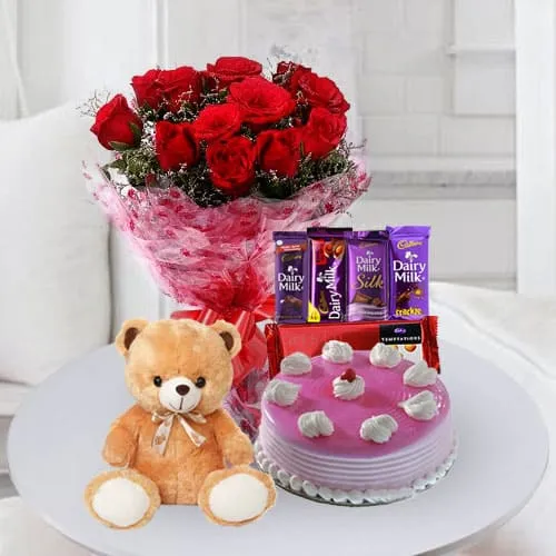 Tempting Cake with Chocolates Teddy n Flowers for Birthday