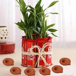 Diya with 2 Tier Lucky Bamboo N Kitkat Arrangement