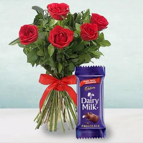 Exclusive 5 Red Roses Bunch with a Cadbury Chocolate Bar