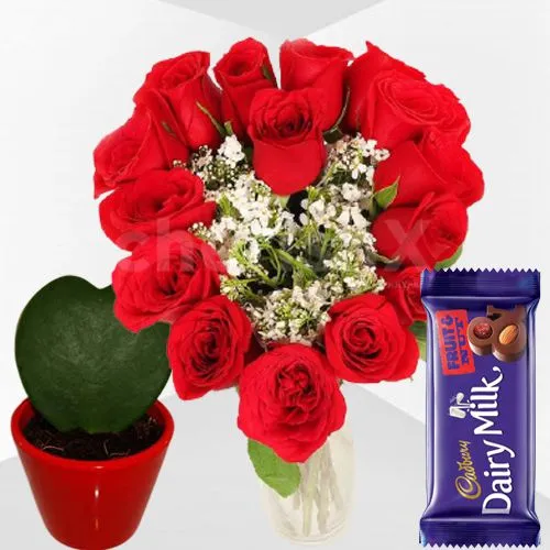Excellent Love Shape Red Roses in Vase Cadbury Fruit n Nut n Hoya Heart Plant