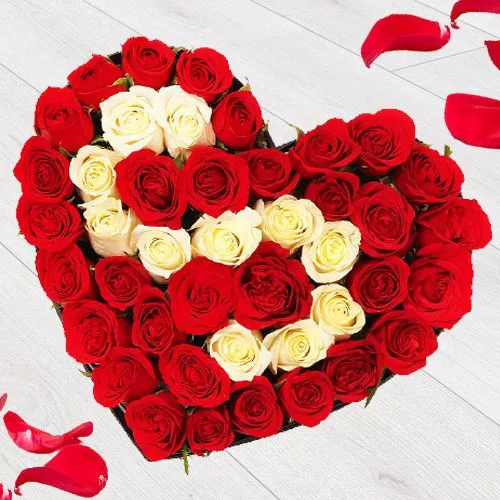 Lovely Heart Shape Arrangement of Red  N  White Roses