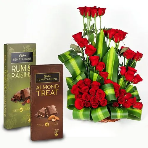 Fabulous Basket Arrangement of 50 Red Roses with Cadbury Temptation