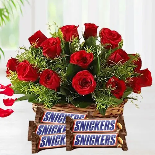 Decorated in Red Roses in Cane Basket n Snickers Peanut Chocolate Bar