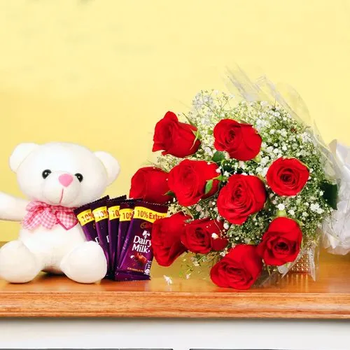 Enigmatic Combo of Cadbury Chocolates Red Roses n Teddy for Valentine