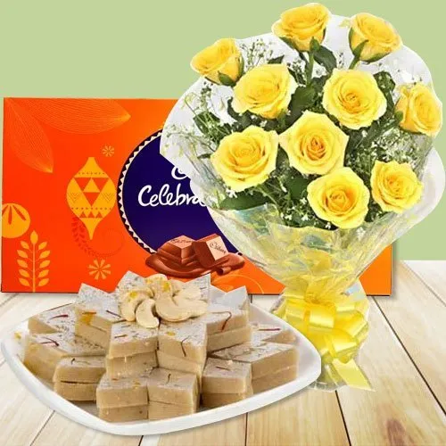 12 Yellow Roses with Cadbury Celebration and Kaju Katli