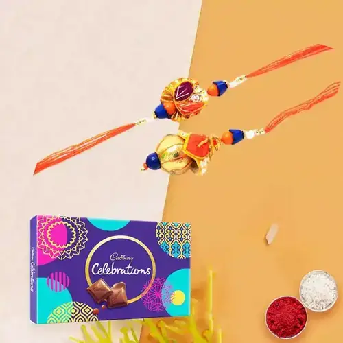 Lovely Rakhi celebration pack with Bhaiya Bhabhi Rakhi free Roli tika and Chawal