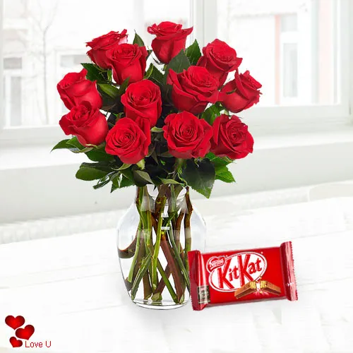 Exclusive Dutch Red Roses in Vase with free Cadburys Chocolate