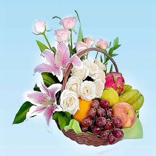 Natures Finest Fruits Basket decorated with Lily and Roses
