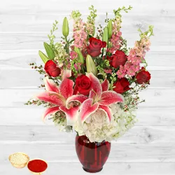 Magnificient bouquet of fresh Lilies with free Roli Tilak and Chawal