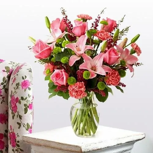 Royal arrangement of Lilies Roses and Carnations