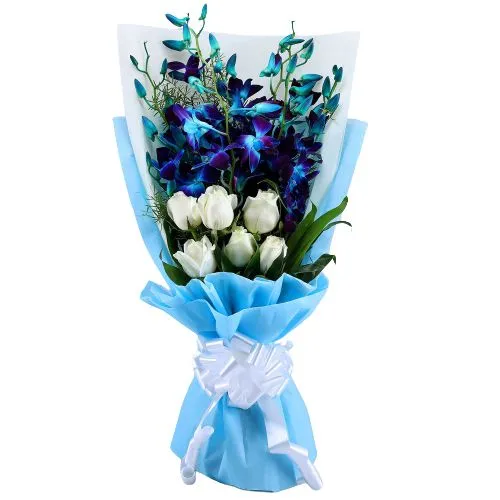 Stunning Tissue Wrapped Bouquet of Blue Orchids N White Roses