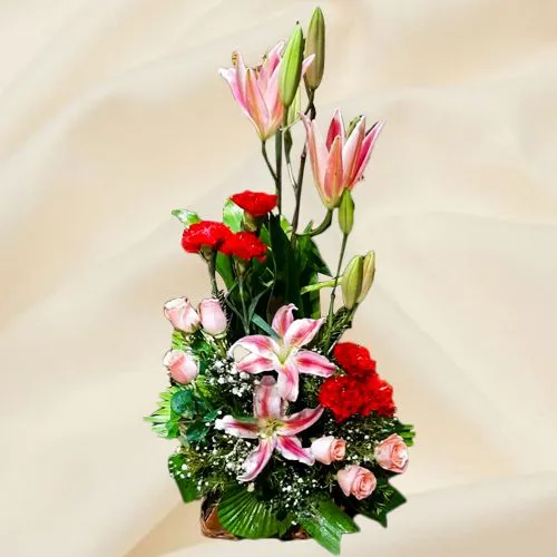 Elegant Arrangement of Pink Lilies with Red Carnations N Pink Roses