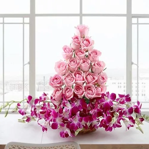 Mind Blowing Arrangement of Roses and Orchids with Love