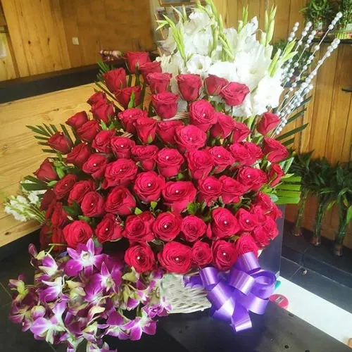 Marvellous Arrangement of Roses Orchids N Tube Roses