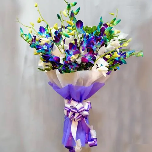 Special Blue n White Orchids Bouquet with Tissue Wrapping