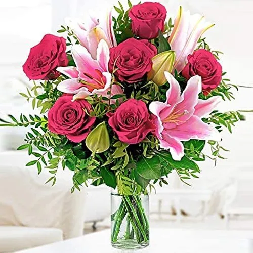 Attractive Lilies with Roses in a Glass Vase