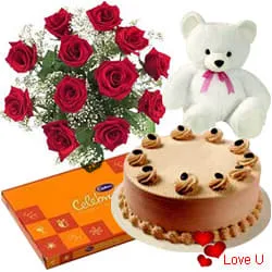 12 Exclusive Dutch Red Roses Bouquet with Cake  Cadburys Assorted Chocolates and a Cute Teddy Bear
