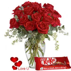 Exclusive Dutch Red Roses in Vase with free Cadburys Chocolate