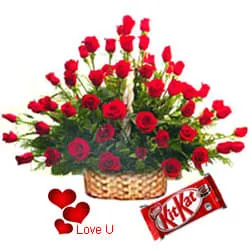 100 Exclusive Dutch Red Roses Arrangement with Cadburys Chocolate