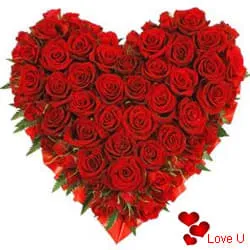 Exclusive Dutch Red Roses in Heart Shaped Arrangement