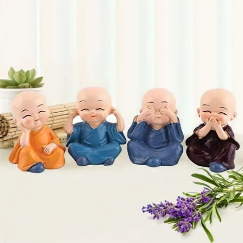 Delightful Set of 4 Buddha Monks Figurines