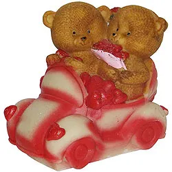 Remarkable Couple Teddy with Hearts in a Car