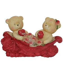 Cheerful Couple Teddy With Two Hearts and Roses in a Boat
