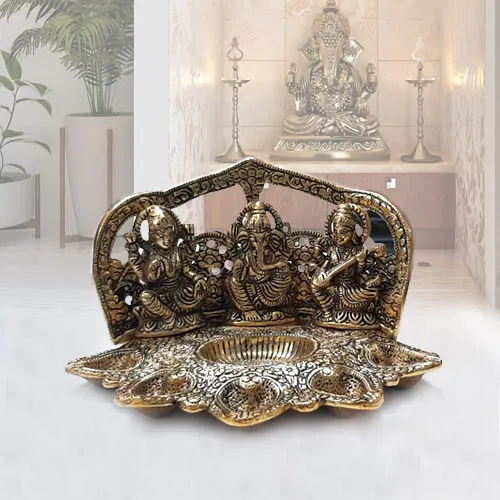 Fabulous Metallic Diya with Ganesh Lakshmi N Saraswati Idol