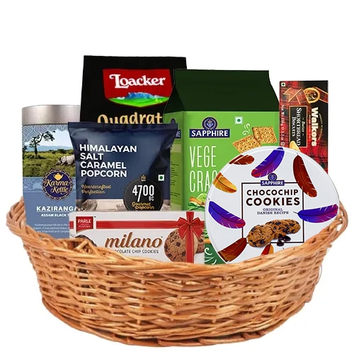 Mouth-Watering Assam Tea N Assortment Delicacy Gift Basket